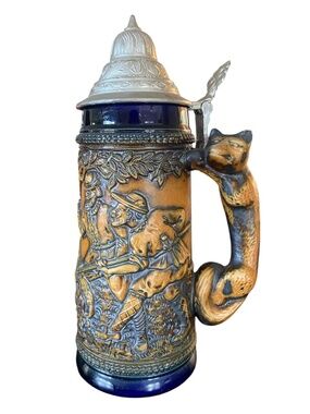 Vintage Gerz German beer sculpted fox handled hunting scene stein.